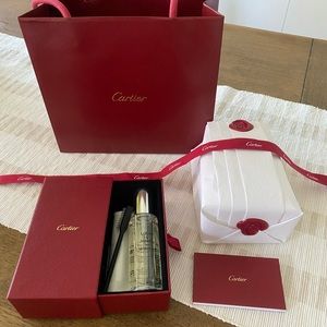 Authentic Cartier cleaning kit, bag, ribbon